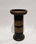Eastern black and gilt painted cluster column jardinière stand with embossed circular raised