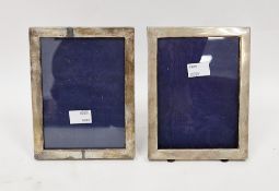 Two silver photograph frames, one Birmingham 1901 and one Birmingham 1908, both of plain rectangular