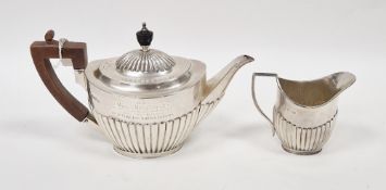 Victorian silver teapot by Mappin Brothers, Sheffield 1895, of oval form with half fluted body and