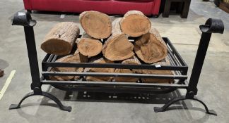 Contemporary hand forged iron fire grate and a pair of firedogs with scrolling terminals together