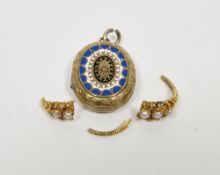 Late 19th / early 20th century yellow metal portrait locket pendant, of oval form with enamel
