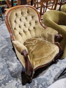 19th century armchair, the mahogany show frame with domed top rail and carved scrolling arms and