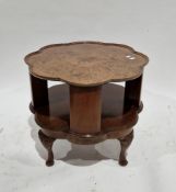 Figured walnut circular and scalloped two-tier revolving bookcase/occasional table on stump cabriole