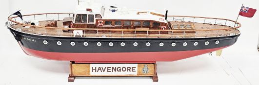 Painted wooden model of the ' Havengore ' survey vessel boat, also used as a ceremonial vessel for