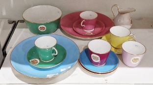 Composite Minton and English porcelain coloured ground monogrammed part breakfast service, circa