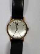 9ct gold cased gentleman's Tissot wristwatch, the silvered face with baton markers, 3cm diameter, on