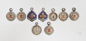 Nine silver and enamel sporting medallions, 120g total approx (9)