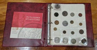 Album of coins including 1889 Victoria silver crown, Elizabeth II coronation medal together with