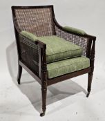 19th century mahogany and bergere library chair having a square back and reeded frame, on turned