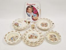 Royal Doulton Bunnykins pattern nursery wares, printed marks, comprising: an egg cup, two warming