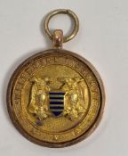 9ct gold and enamel sporting medallion by Thomas Fattorini, Hockley Street, Birmingham, 10g approx