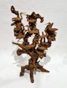 South East Asian large hand carved teak root sculpture depicting multiple storks/cranes, standing on