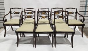 Set of eight Regency style simulated rosewood and brass dining chairs (including two carvers),