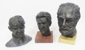 Three plaster sculptural busts of men with a bronze finish, two mounted on wooden plinths, largest