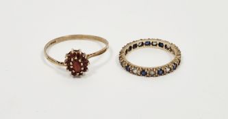 9ct gold, blue and white stone set eternity ring and 9ct gold and garnet cluster ring, 3.4g gross