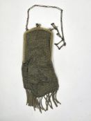 Art Deco yellow metal and chainmail cocktail purse, the clasp set with two blue glass stones, 17cm