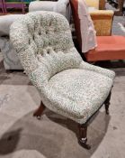 Victorian nursing chair, the button back with later leaf pattern upholstery, on turned fluted