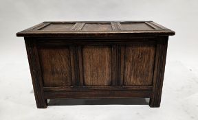 Small oak coffer in the 18th century style, having three-panel hinged lid over a three-panel
