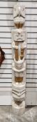 Replica native American totem pole with a white crackle glaze and gold-coloured finish, in the