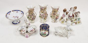 Group of English and continental porcelain, 19th century, comprising a garniture of three