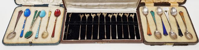 11 silver cocktail stirrers by Barker Brothers Silver Limited, Birmingham 1935, each surmounted by a