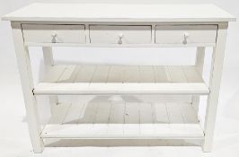 Modern white painted side cabinet, the rectangular top over three frieze drawers and two tongue