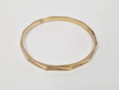 9ct gold bangle of hollow panelled form with engraved decoration, 13.2g approx