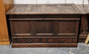 18th/19th century oak mule chest, the four-panel hinged lid opening to a lidded candle box, the