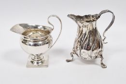 Edwardian silver cream jug, Birmingham 1903, of helmet shape on square pedestal base, 8cm high and