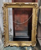 Large 19th century giltwood and gesso picture frame, moulded with flowers, shells and foliate