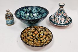 Group of contemporary Moroccan pottery including a tagine dish and conical cover, a turquoise glazed
