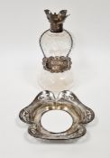 Glass and silver-mounted decanter, the waisted cut glass body with silver collar (missing