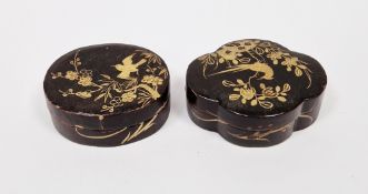 Two 19th century Japanese black and gilt lacquer small boxes and covers, each decorated in gilding