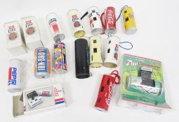 Collection of sixteen novelty advertising can cameras including a 7Up camera in original