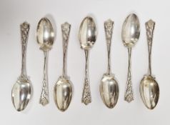 Set of seven silver teaspoons by Josiah Williams & Co, London 1926, the stems modelled as golf