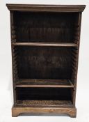 Oak library bookcase with two adjustable shelves, on bracket feet, 112cm high x 70cm wide x 29cm