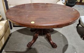 Victorian mahogany loo or centre table, the oval tilt top on turned baluster column support and four