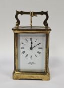 French gilt brass carriage clock, the movement stamped R & Co for Richard & Co, bevelled glass