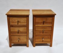 Pair hardwood bedside chests, each of three drawers with polished metal knob handle, 75cm high x