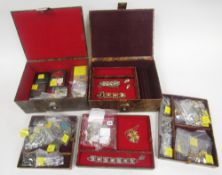 Two Egyptian style jewellery boxes with a collection of costume jewellery including bracelets,