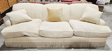 Howard-style country house large cream upholstered three-seater sofa with bullion fringe and three