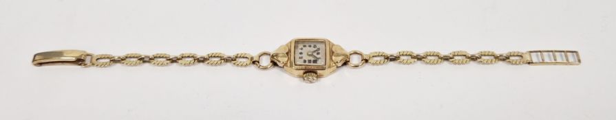 Lady's 9ct gold wristwatch, mid-20th century, on 9ct gold oval flat link bracelet, 11.8g approx