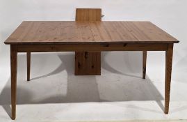 Modern pine extending dining table with one additional leaf, on square tapering legs, 74cm high x