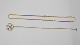 9ct yellow gold pendant of round form with open floral decoration, 2.6cm diameter, on a 9ct gold