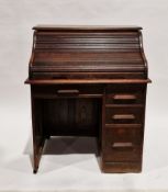 Victorian small oak roll top desk, the roll top over a single pedestal having a brush slide and