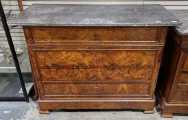 19th century French Louis Philippe figured walnut commode, the grey marble top over a long frieze