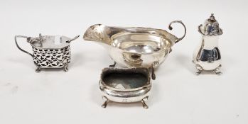 Silver sauceboat, London 1907 of typical form with wavy rim and leaf cap scroll handle, 7cm high,