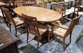 Mid-century G-Plan Fresco teak extending dining table of oval form, 73cm high x 163cm long (