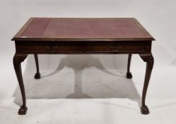 Mahogany veneered writing desk in the Queen Anne manner, the rectangular top with red leather