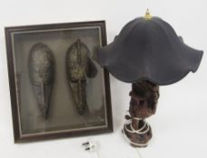 Pair of 20th century Malian Marka masks of typical narrow elongated form, wooden and covered in thin